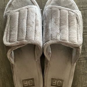 Worn grey slippers